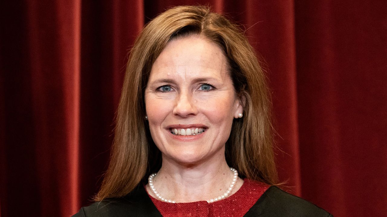 Associate Justice Amy Cooney Barrett stands during a group photo of the justices at the Supreme Court in Washington, D.C., on April 23, 2021. (Photo by ERIN SCHAFF/POOL/AFP) (Photo by ERIN SCHAFF/POOL/AFP via Getty Images)